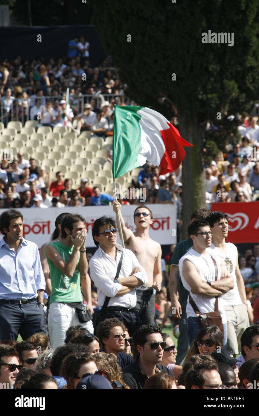 italian supporters watching italy v slovakia at world cup fan fest village in rome, italy 2010 Stock Photo