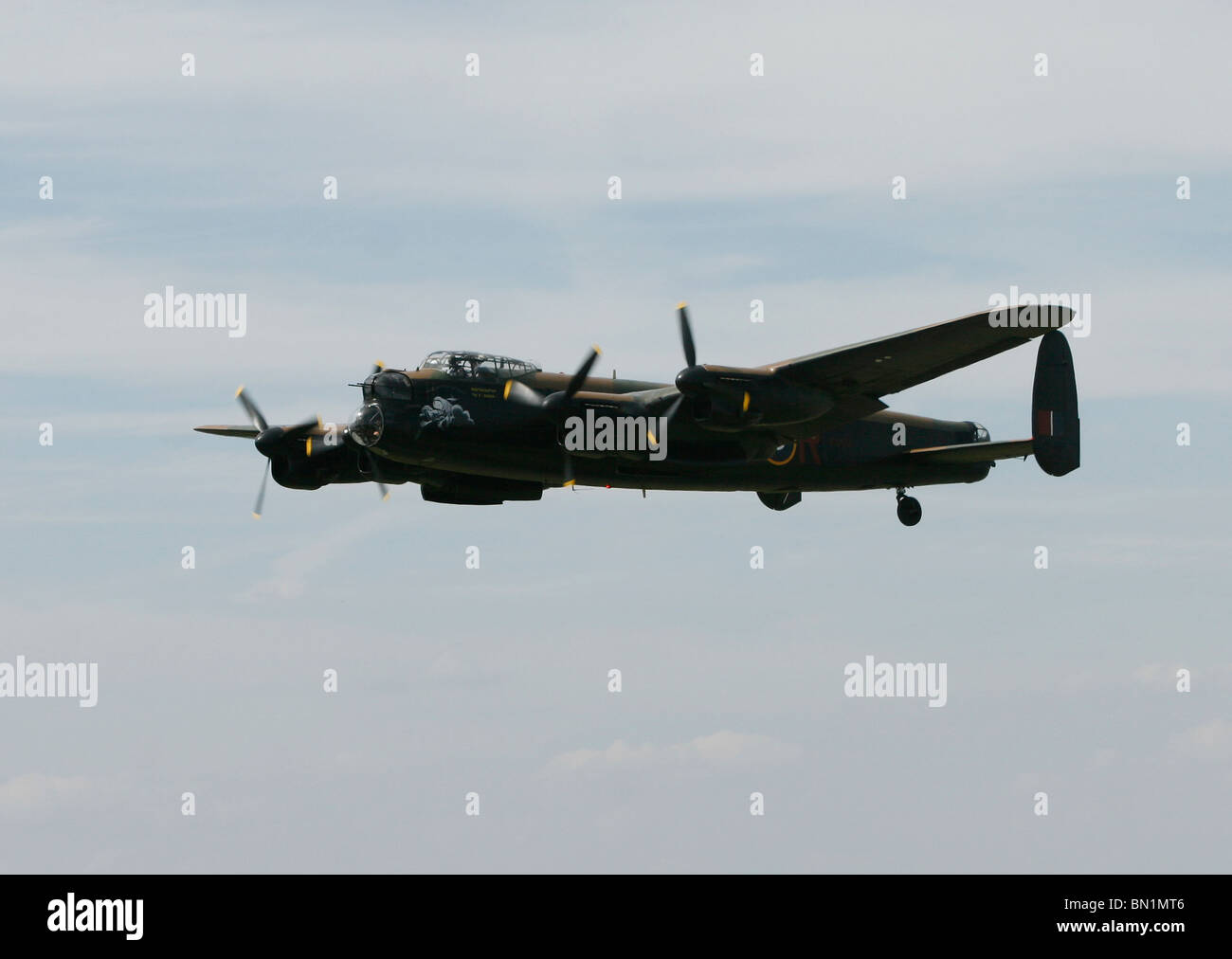 Original Lancaster Bomber - one of only two still flying - flying over Kent  in England Stock Photo - Alamy