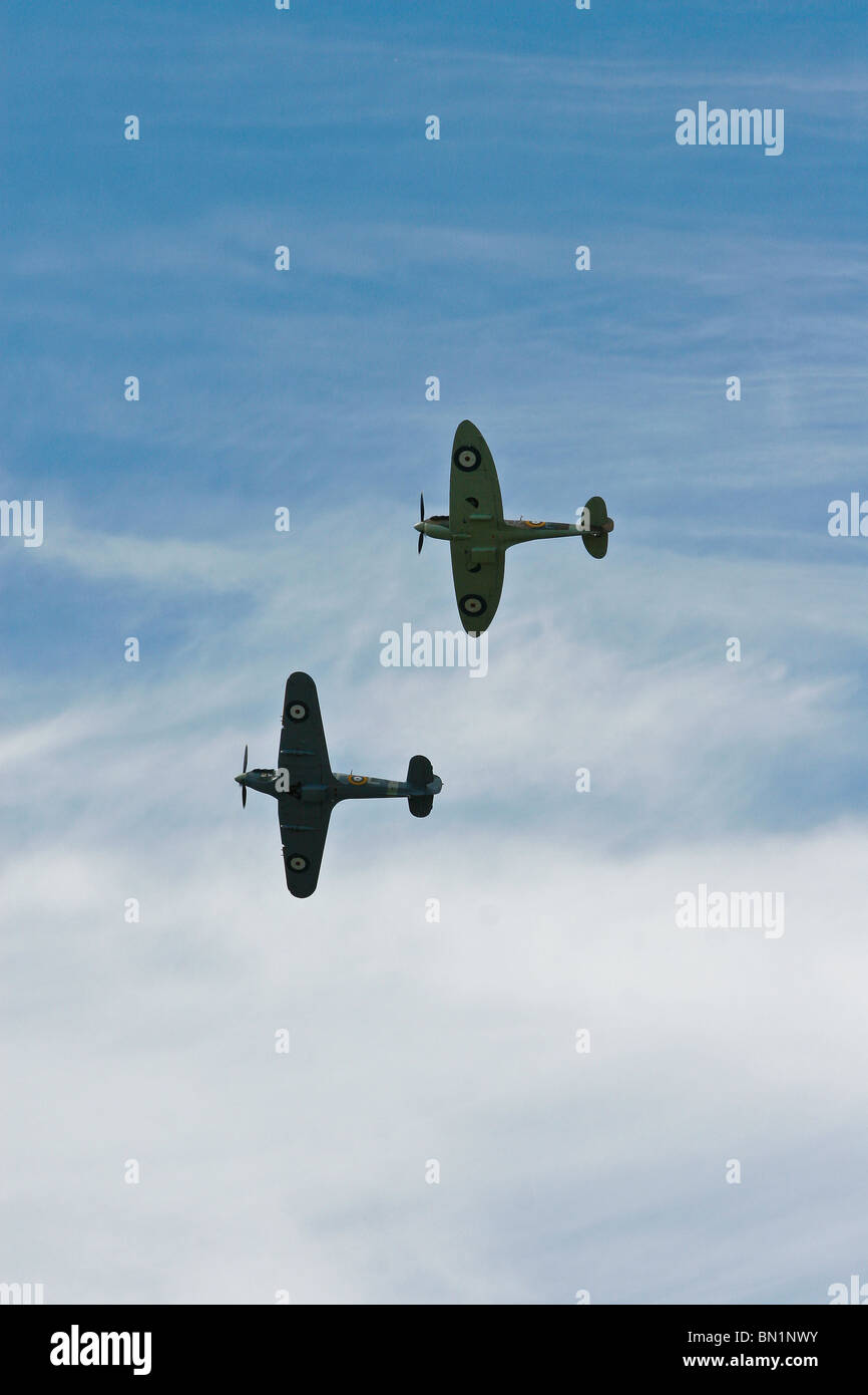 Hurricane and Spitfire aircraft flying over Kent England Stock Photo