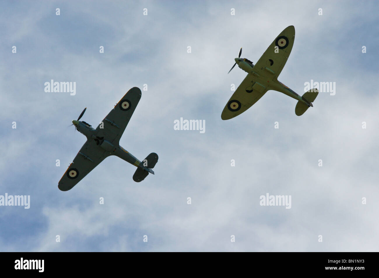 Hurricane and Spitfire aircraft flying over Kent England Stock Photo