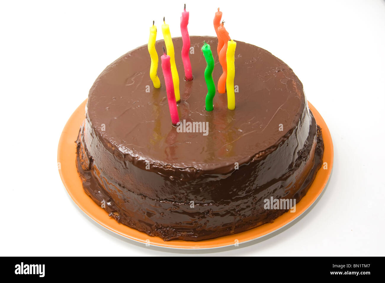 chocolate birthday cake with candles Stock Photo