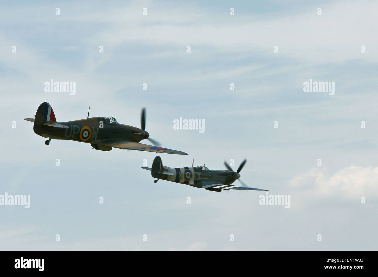 Hurricane and Spitfire aircraft flying over Kent England Stock Photo