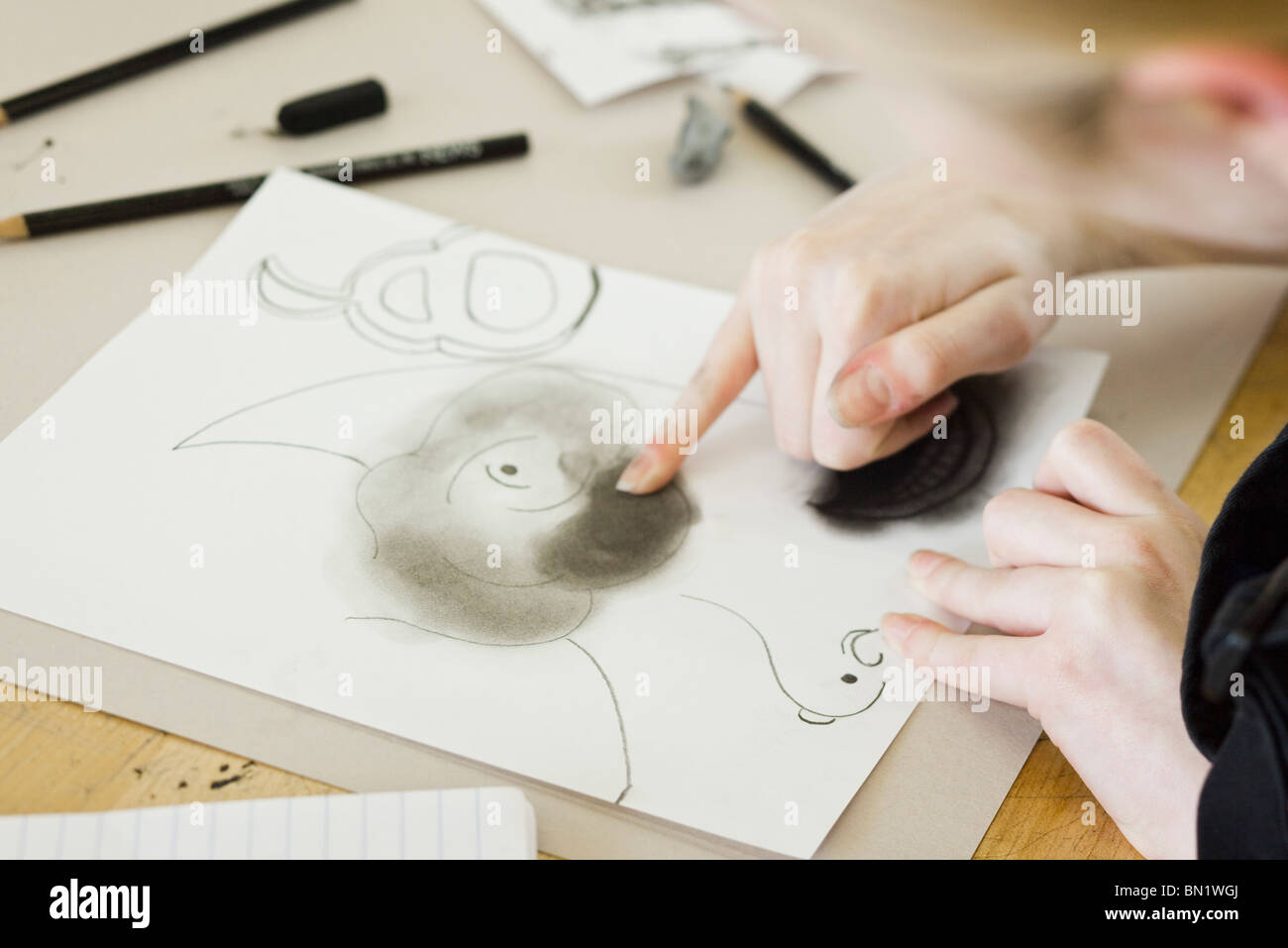 Artist drawing with charcoal Stock Photo Alamy