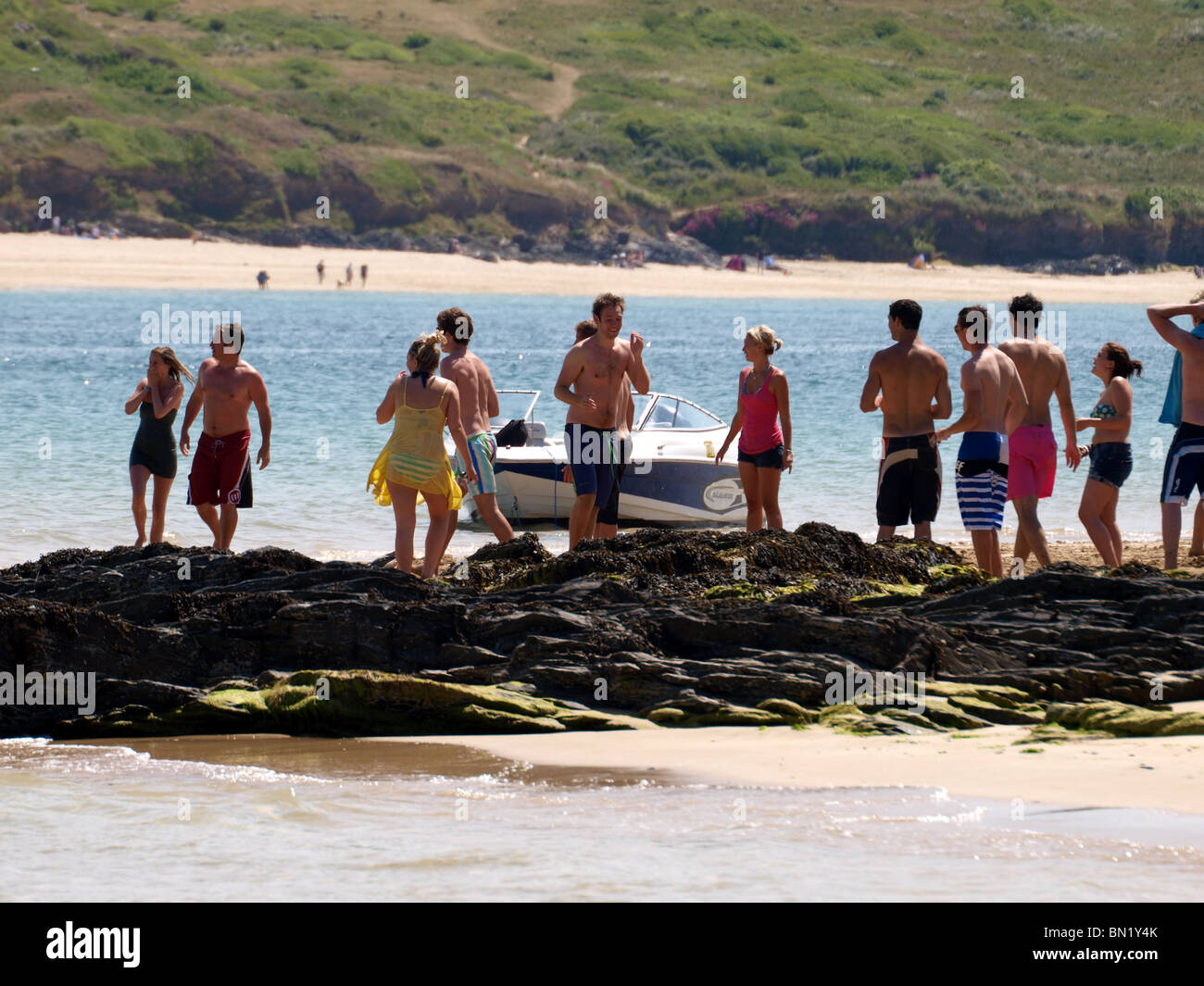 Group of young people at the beach, Padstow, Cornwall, UK Stock Photo ...
