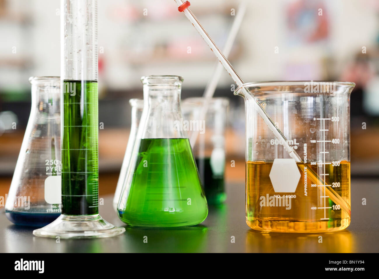 Chemicals in beakers Stock Photo Alamy