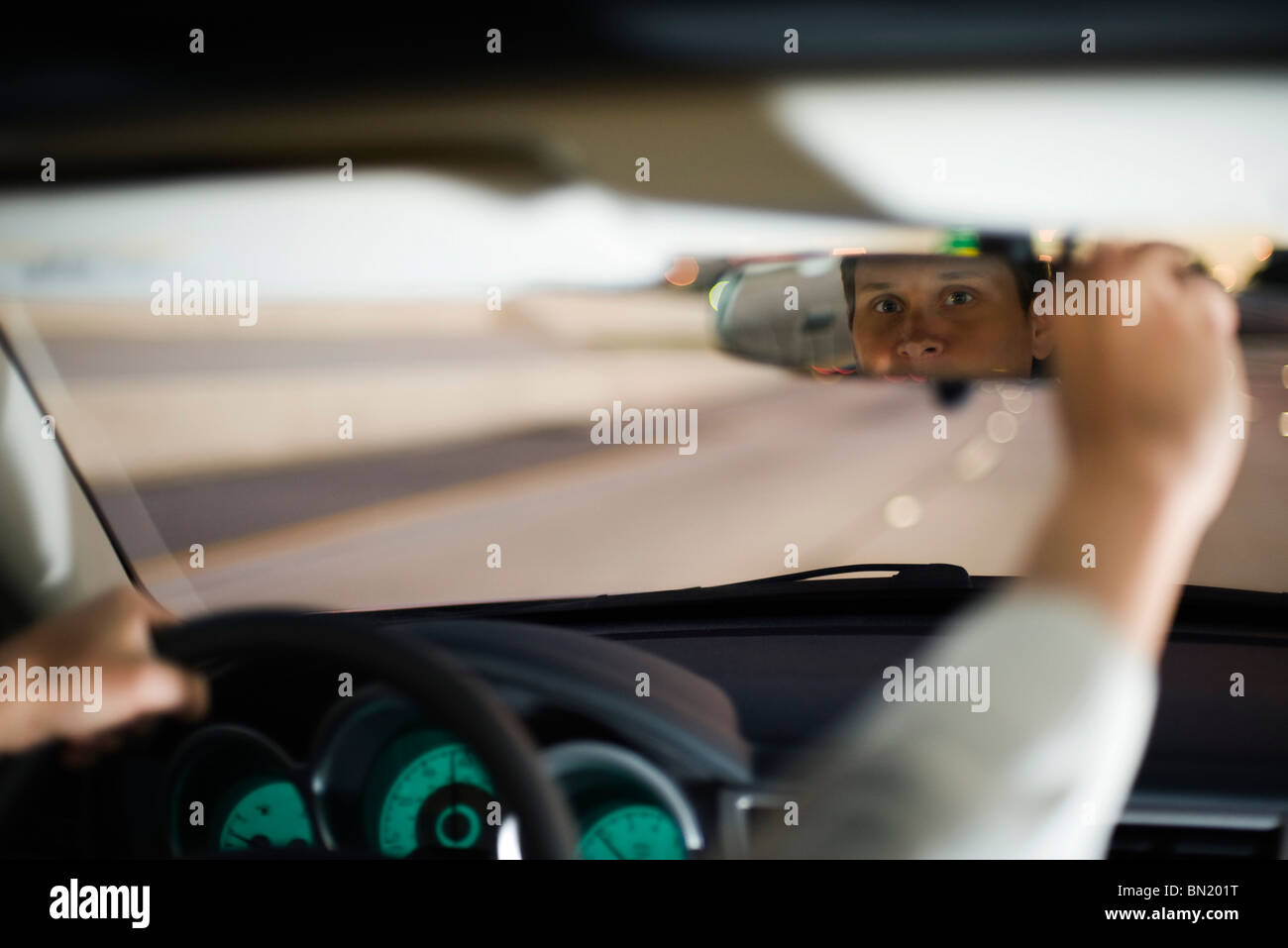 Driver Driving Adjusting Rearview Mirror Stock Photo Alamy Driver Driving Adjusting Rearview Mirror Stock Photo Alamy