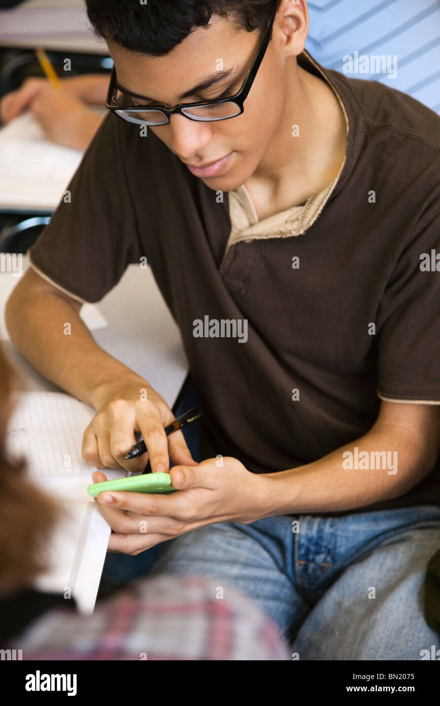 High school student using calculator in class Stock Photo Alamy