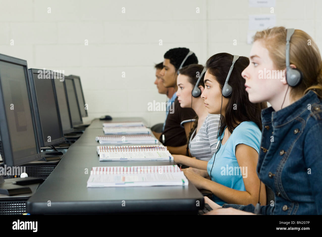 Students learning in computer lab Stock Photo - Alamy
