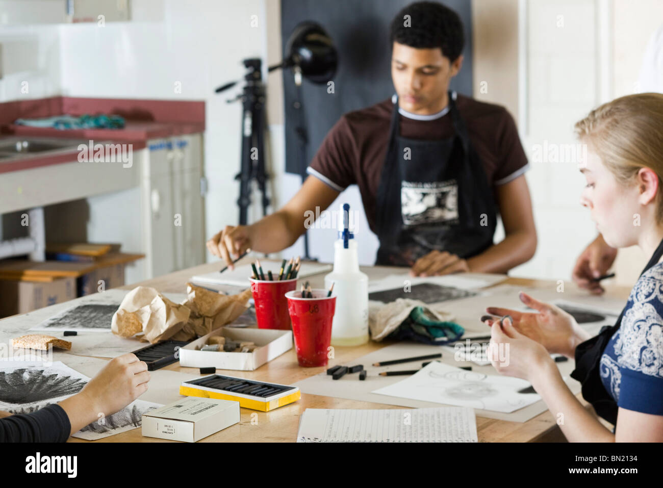 Students drawing in art class Stock Photo