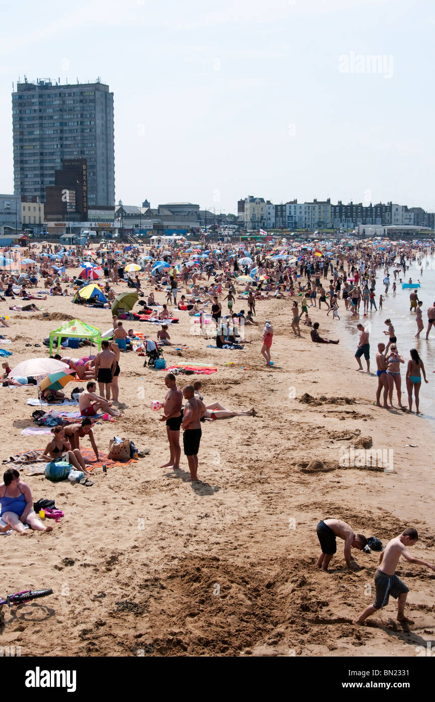 A crowded Margate Beach on a hot summer weekend, England Stock Photo
