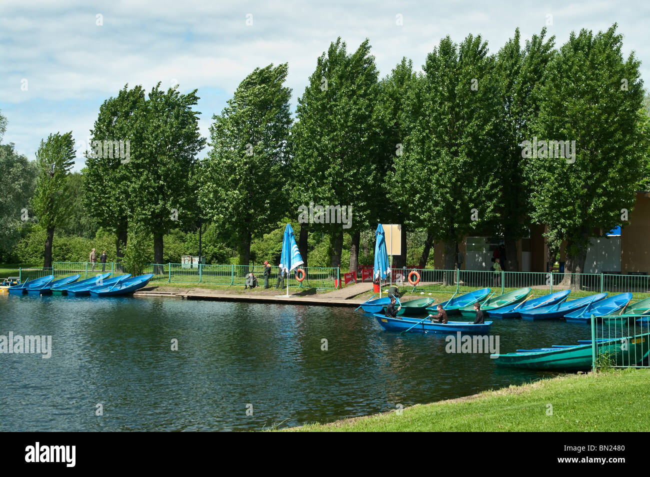 Pleasure boats on the lake in the park. Boat station of St.-Petersburg, Russia Stock Photo