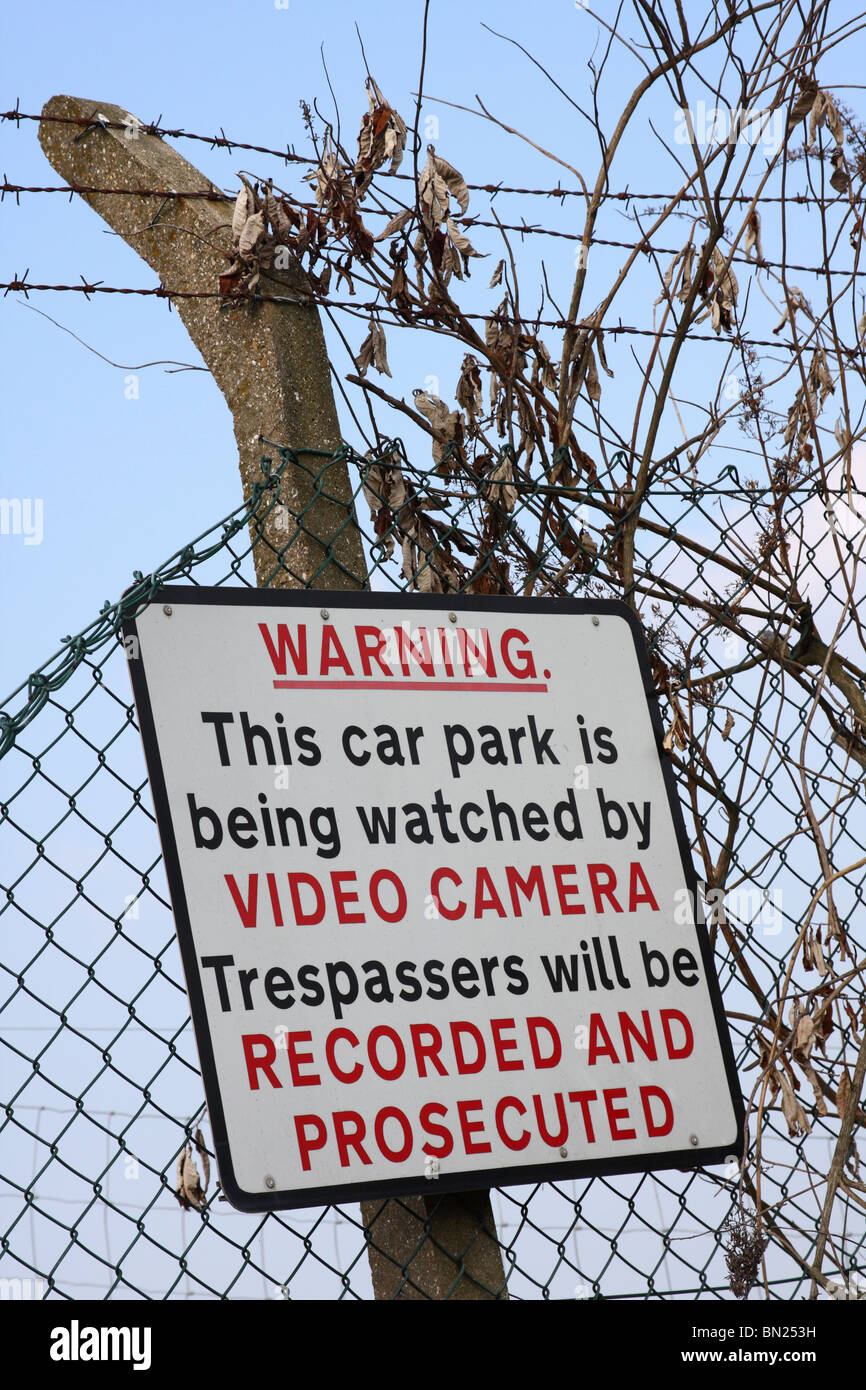 A surveillance camera warning sign on private land in a U.K. city. Stock Photo