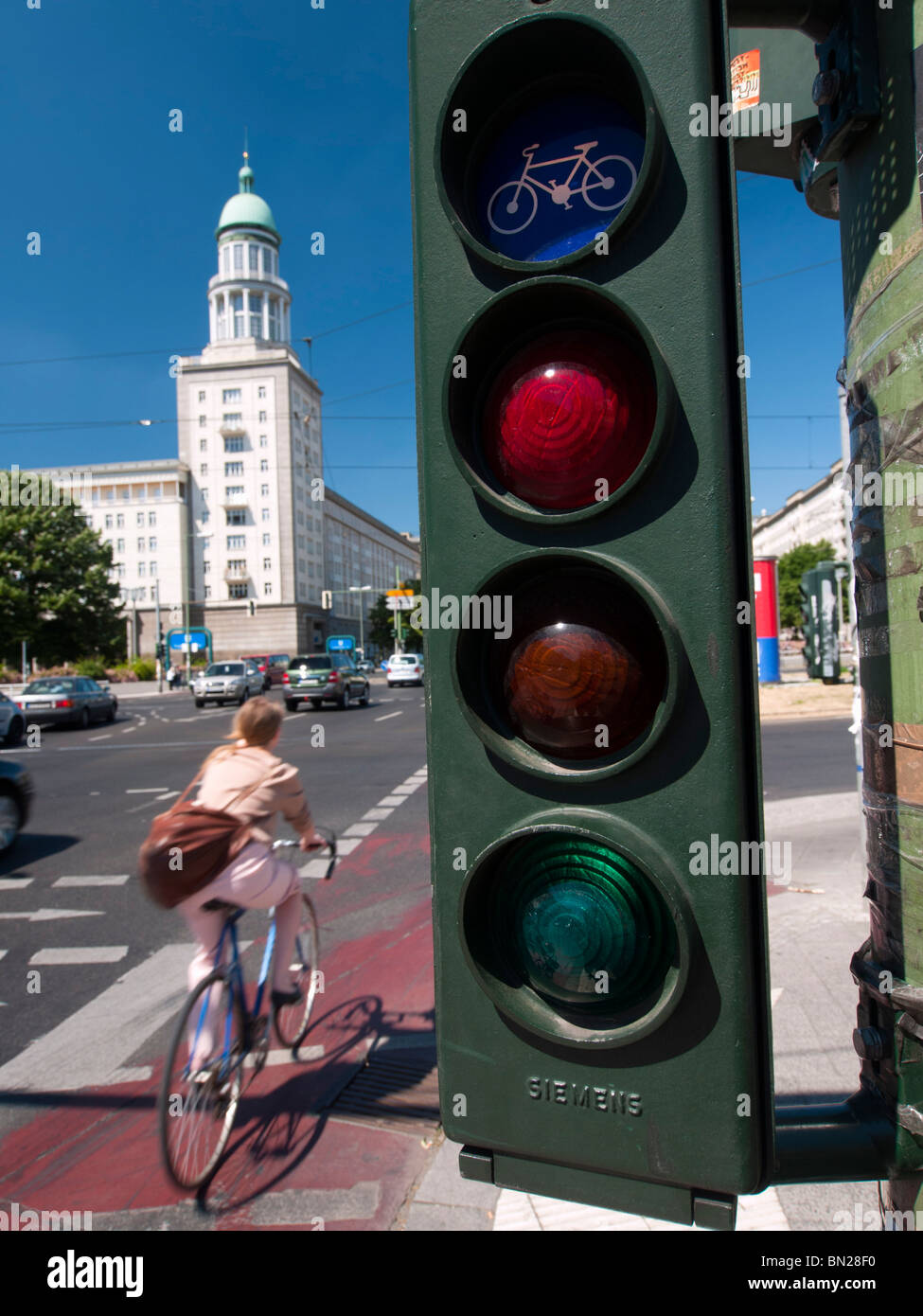 Bicycle traffic lights at Frankfurter Tor on Karl Marx Allee in former east Berlin in Germany Stock Photo