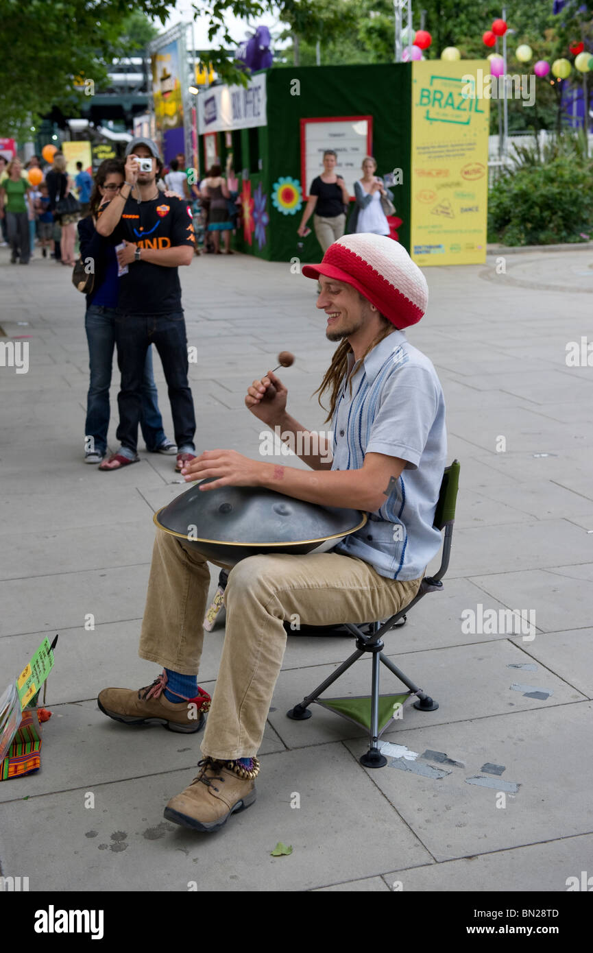 Daniel Waples plays a Hang, a Swiss designed instrument, on London's