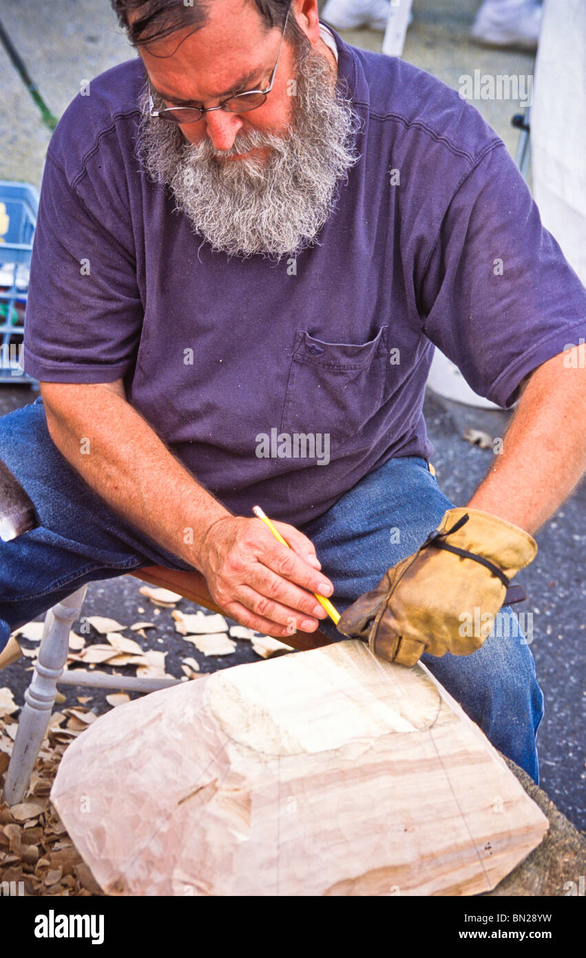 One crafts man using tools to outline project Stock Photo