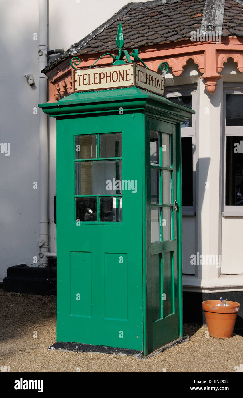 Historic Grade II Listed green telephone box outside Boulters Inn on Boulters Inn island Maidenhead Berkshire England UK Stock Photo