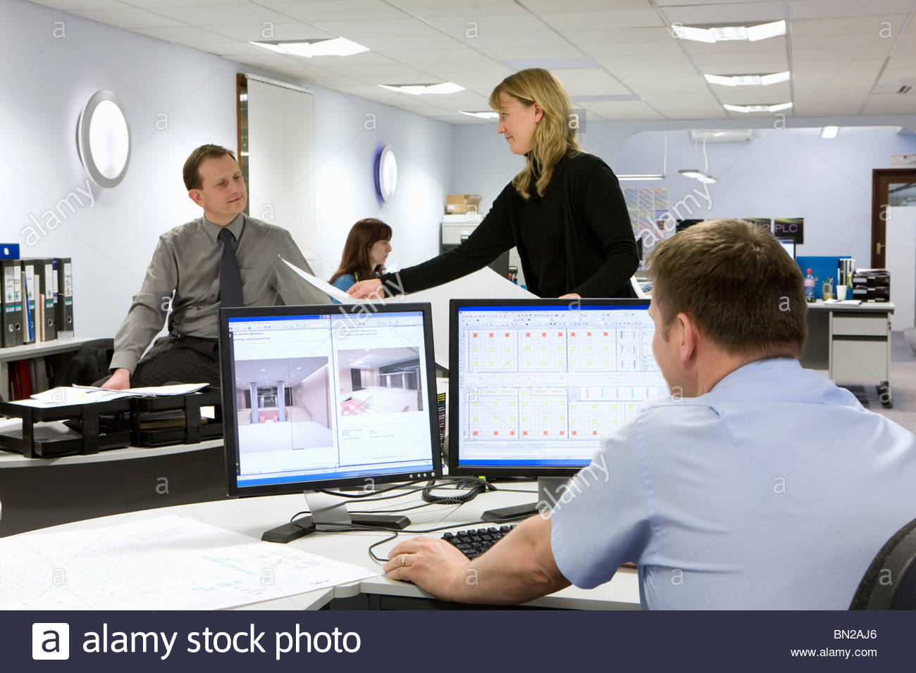 CAD designers and architects working in office Stock Photo 30170398