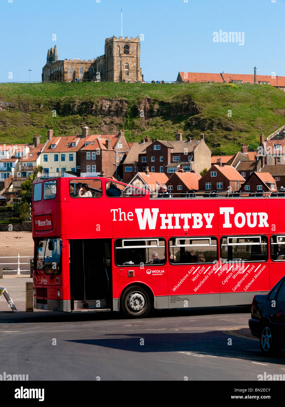 Whitby tour bus on the harbourside, Whitby, North Yorkshire Stock Photo