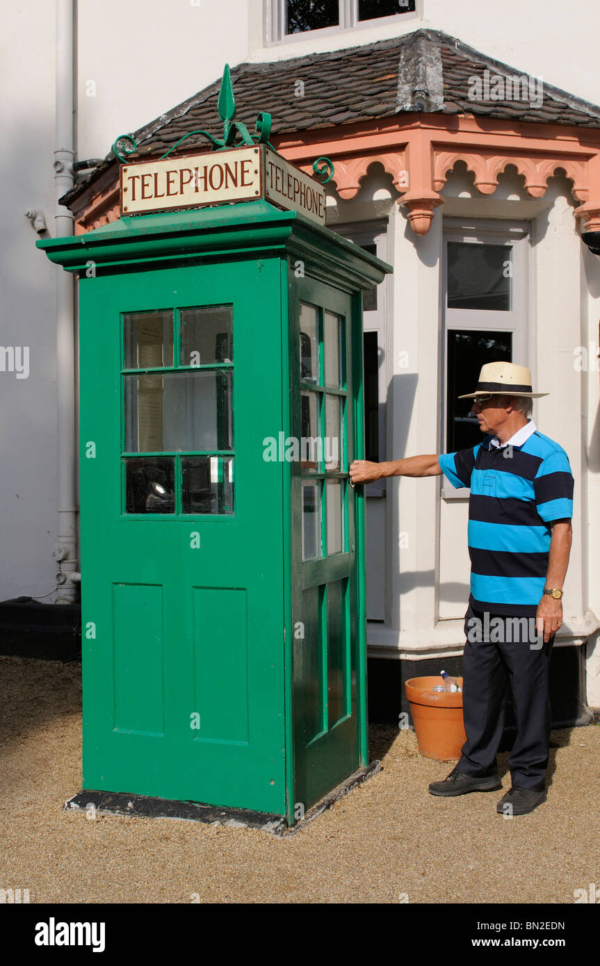 Historic Grade II Listed green telephone box outside Boulters Inn on Boulters Inn island Maidenhead Berkshire England UK Stock Photo