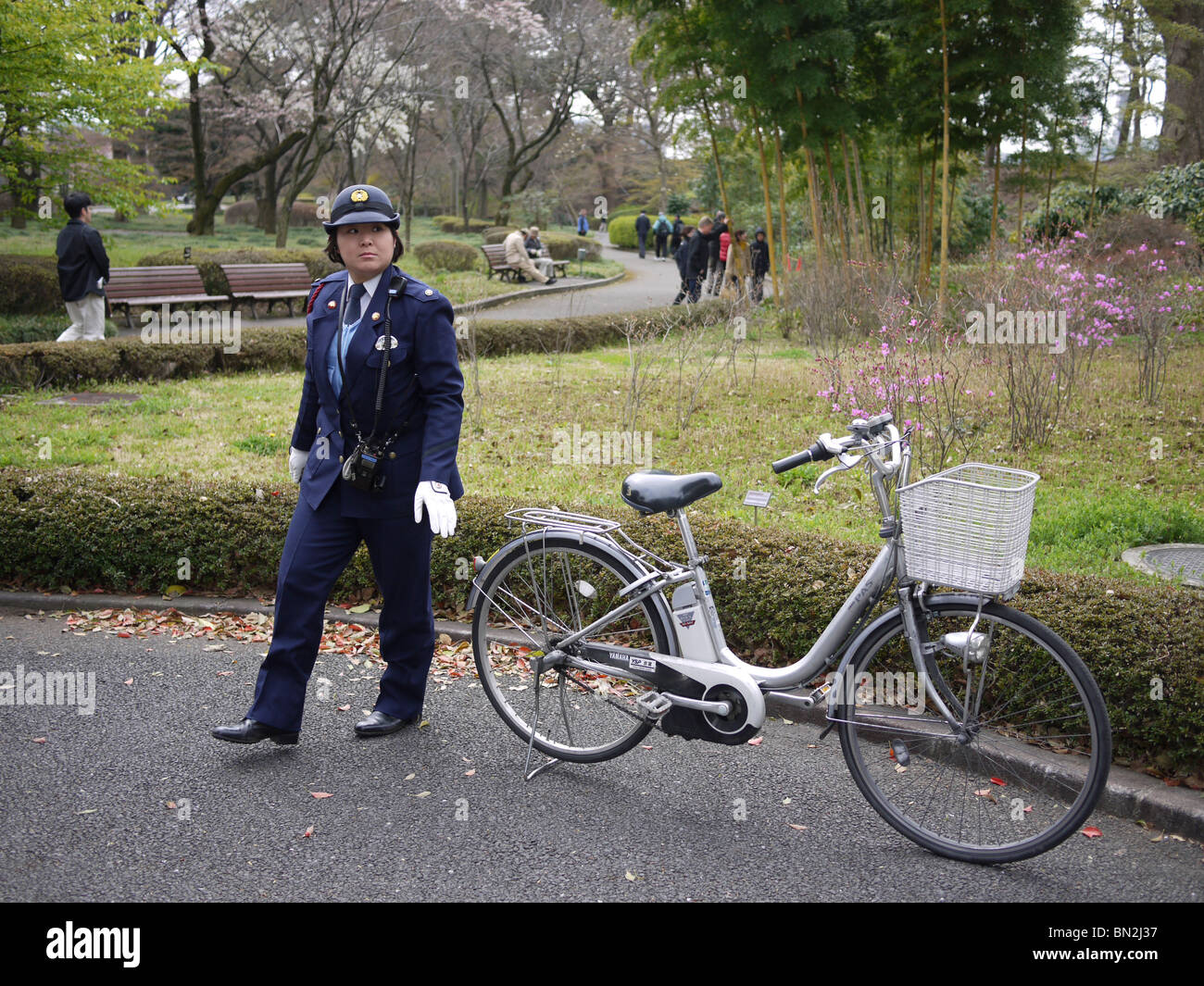 Japan, Tokyo Policeman on a Bicycle Stock Photo