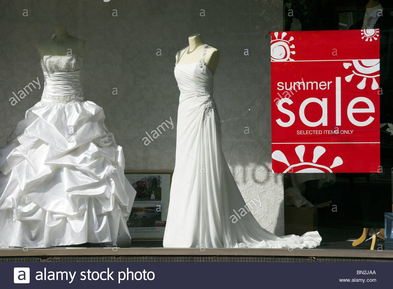 Wedding Dress Clothing Shop Summer Sale Seen Thru A Shop Window