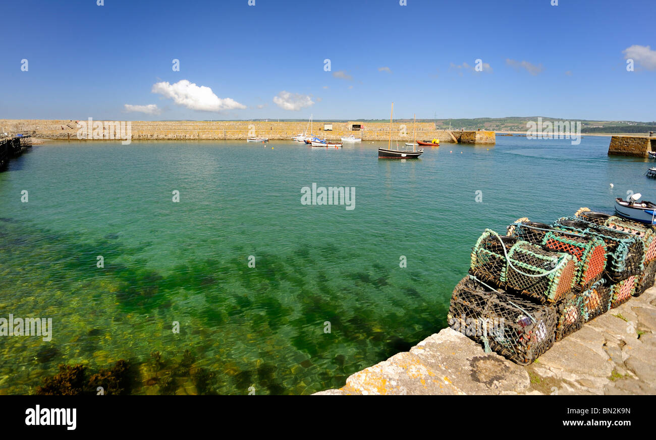 Lobster pots sit on the quayside Stock Photo Alamy