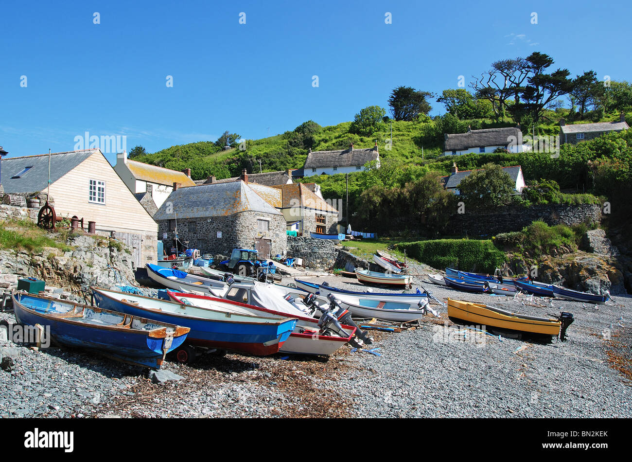 fishing boats on the beach at the small cove of cadgwith in cornwall, uk Stock Photo