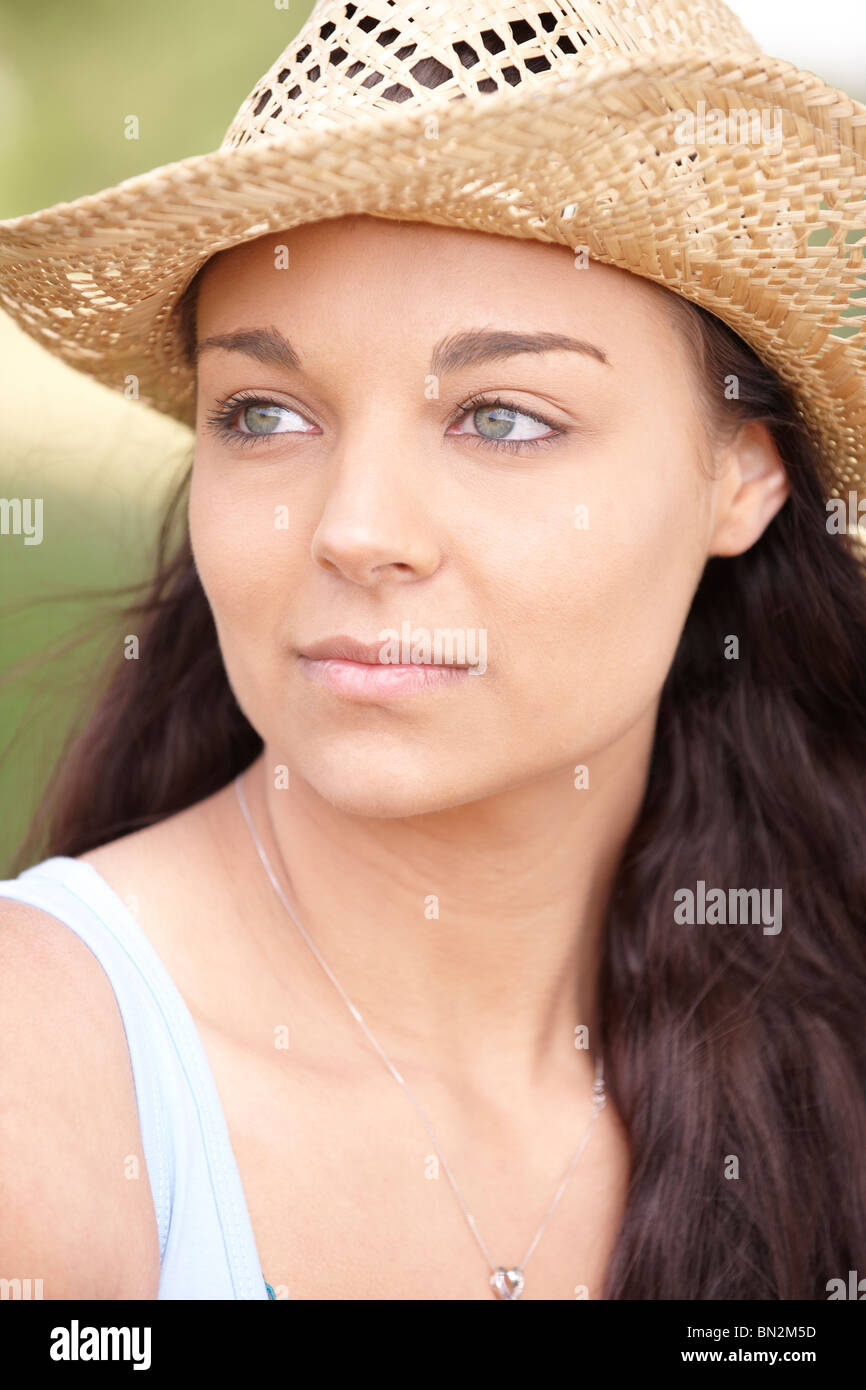 portrait of thoughtful attractive young woman wearing straw hat Stock ...