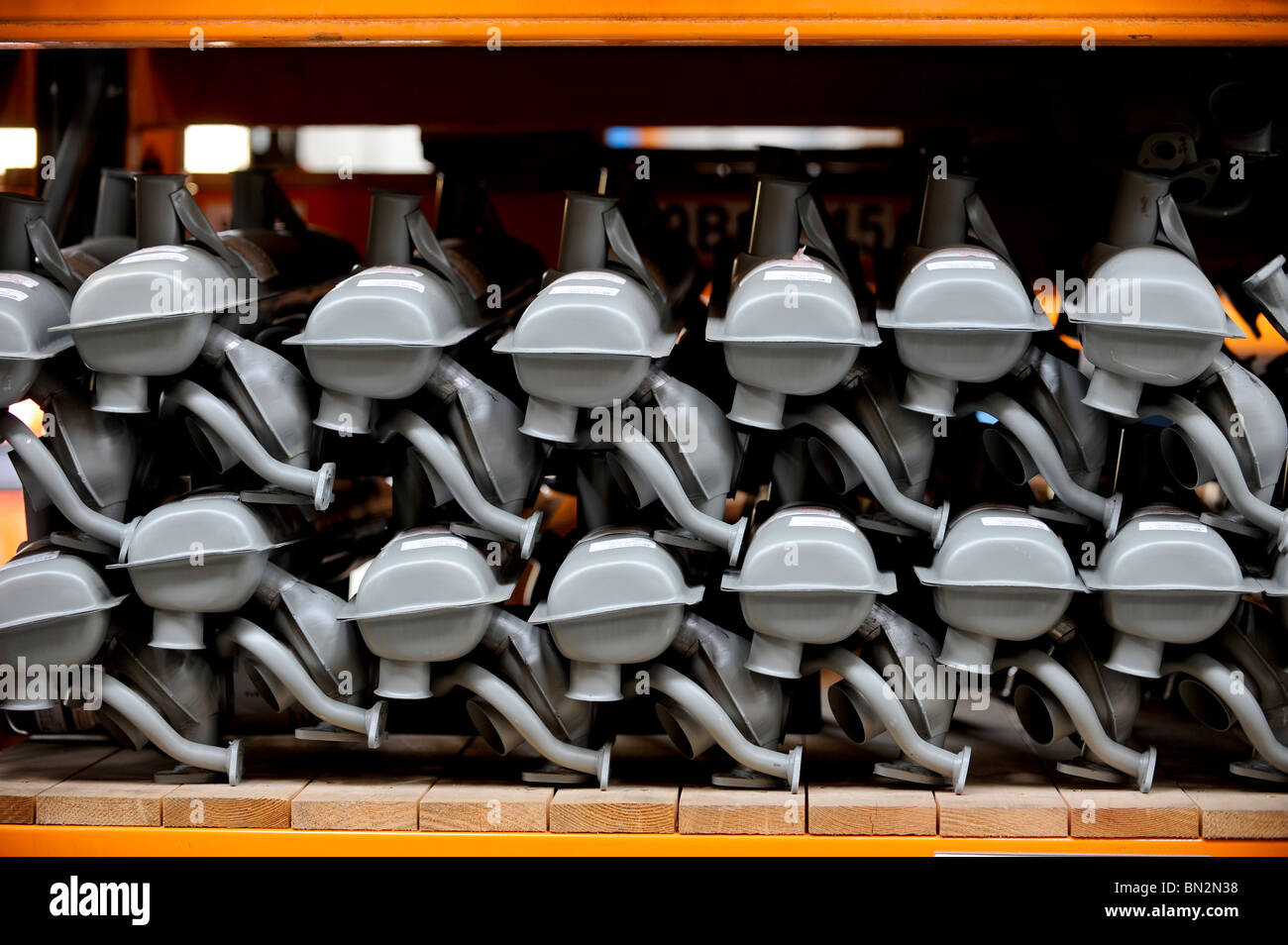 Spare parts for VW camper vans and cars stacked on a supplier's shelves. Stock Photo