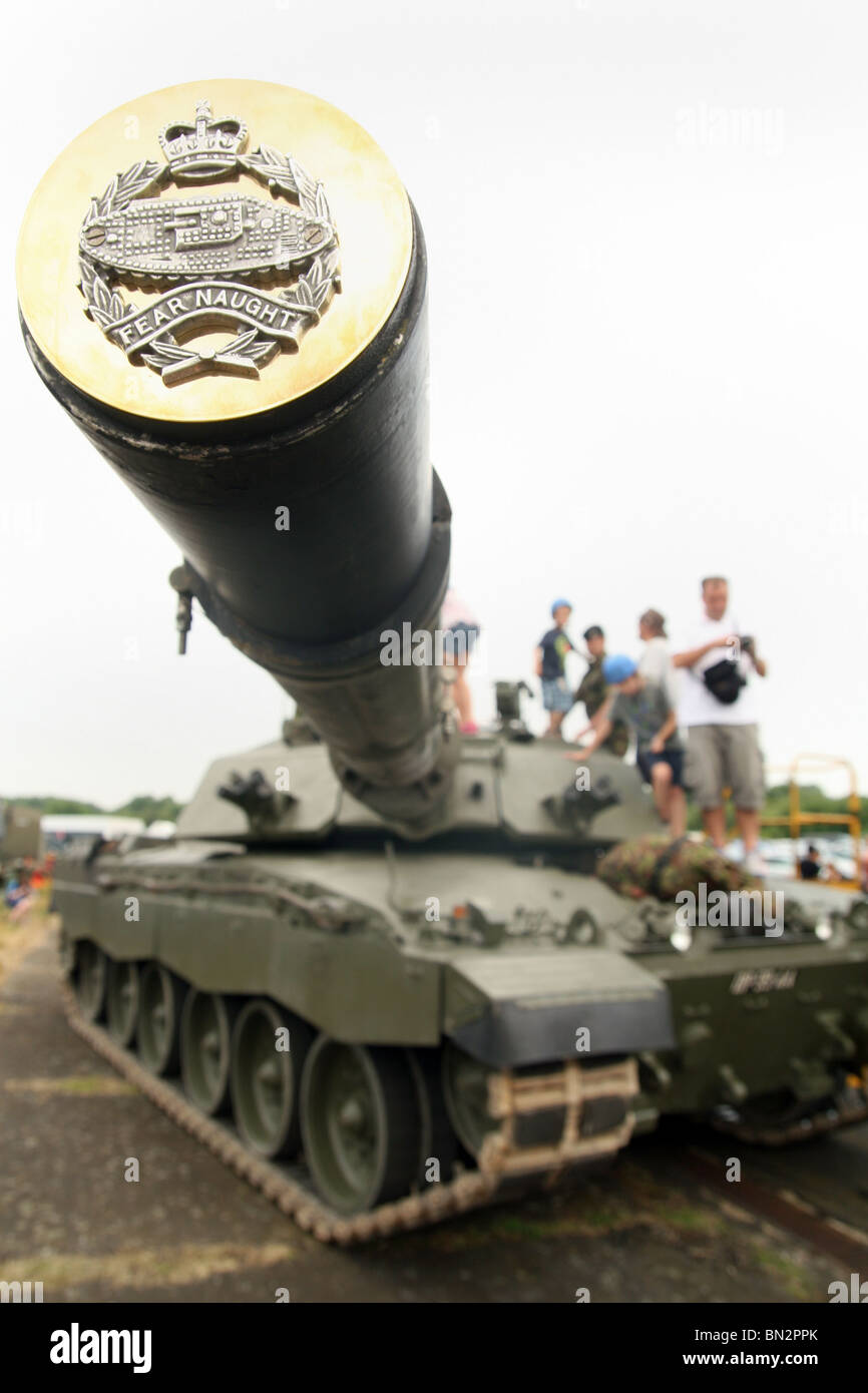 Visitors to the 2010 Biggin Hill Air Fair pour over a British Army Centurion Tank in Kent Stock Photo