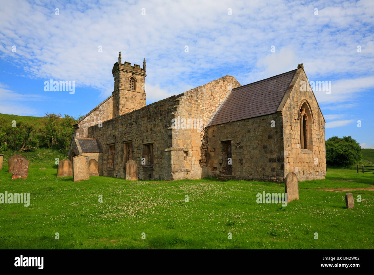 The ruins of St Martin's Church Wharram Percy, deserted medieval village on the Yorkshire Wolds Way, North Yorkshire, England, UK. Stock Photo