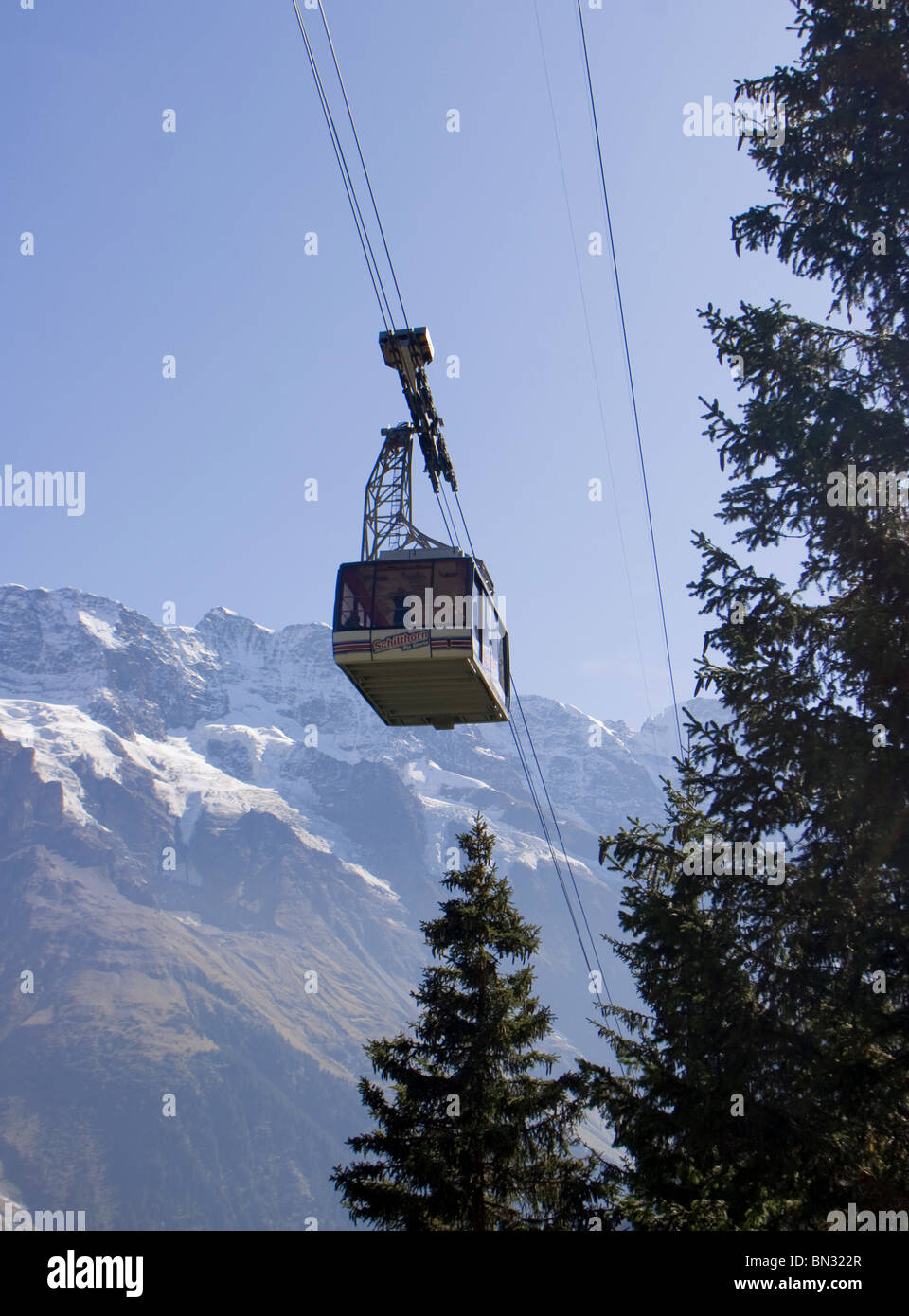 Swiss Alps aerial: Cable Car going to the Swiss village Mürren and the Schilthorn view point and ski area. Stock Photo