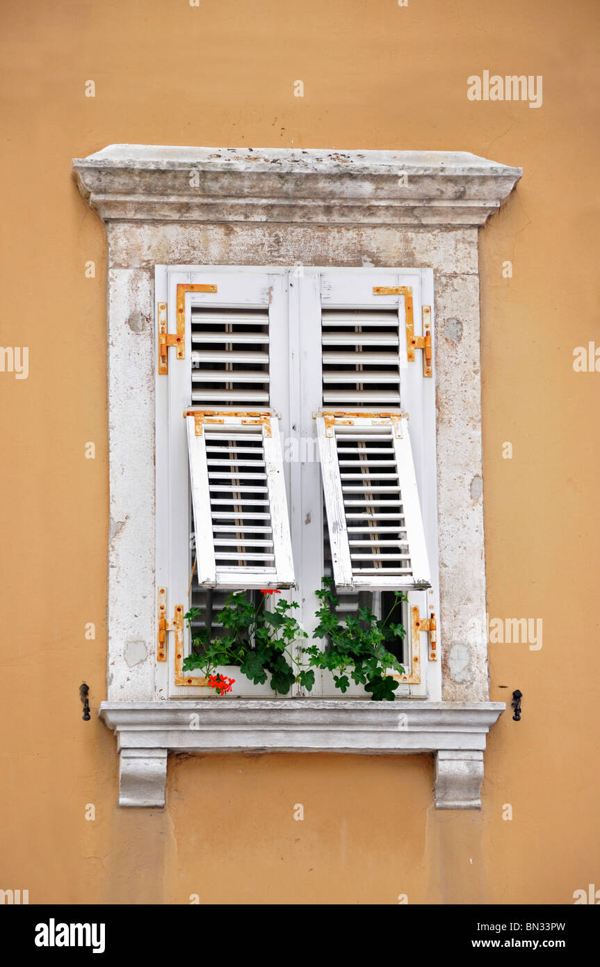 Old window with closed wooden shutters Pula Istria Croatia Stock Photo ...