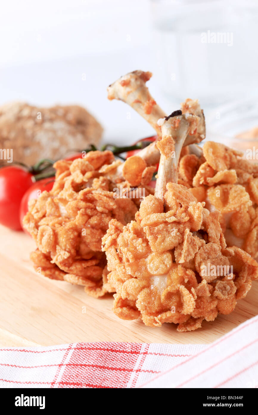 Deep fried chicken drumsticks coated with corn flakes Stock Photo Alamy