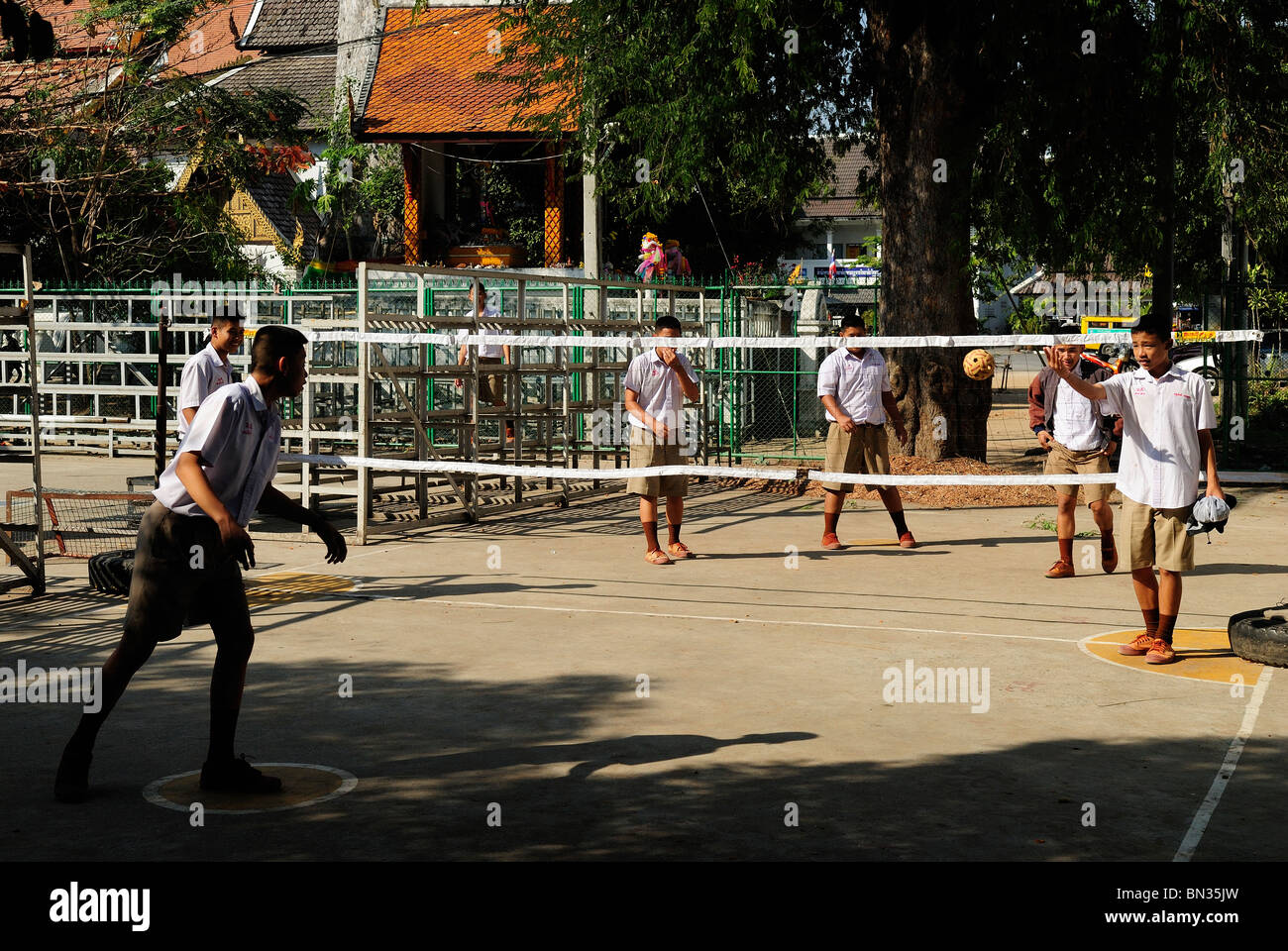 Thai men playing Sepak takraw (kick volleyball) Chiang Mai, Thailand