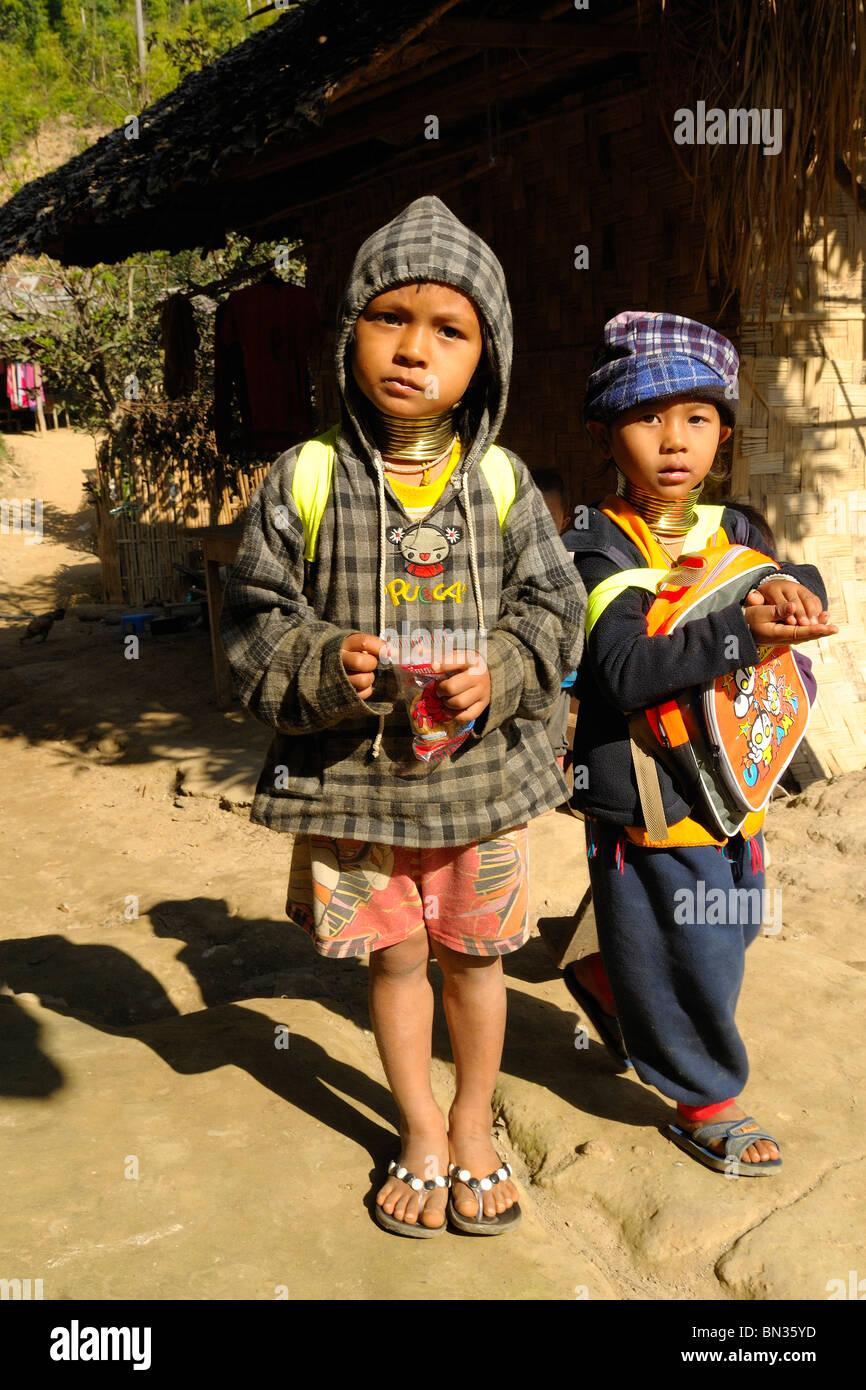 Kayan (ethnic minority) kids also called longneck wearing gold rings around her neck, Mae Hong Son, Northern Thailand, Asia Stock Photo
