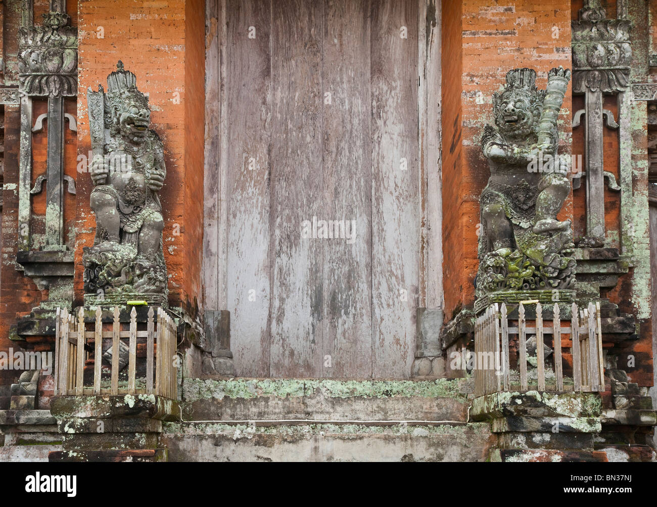 Garuda door guards standing either side of a temple doorway, Bali, Indonesia Stock Photo