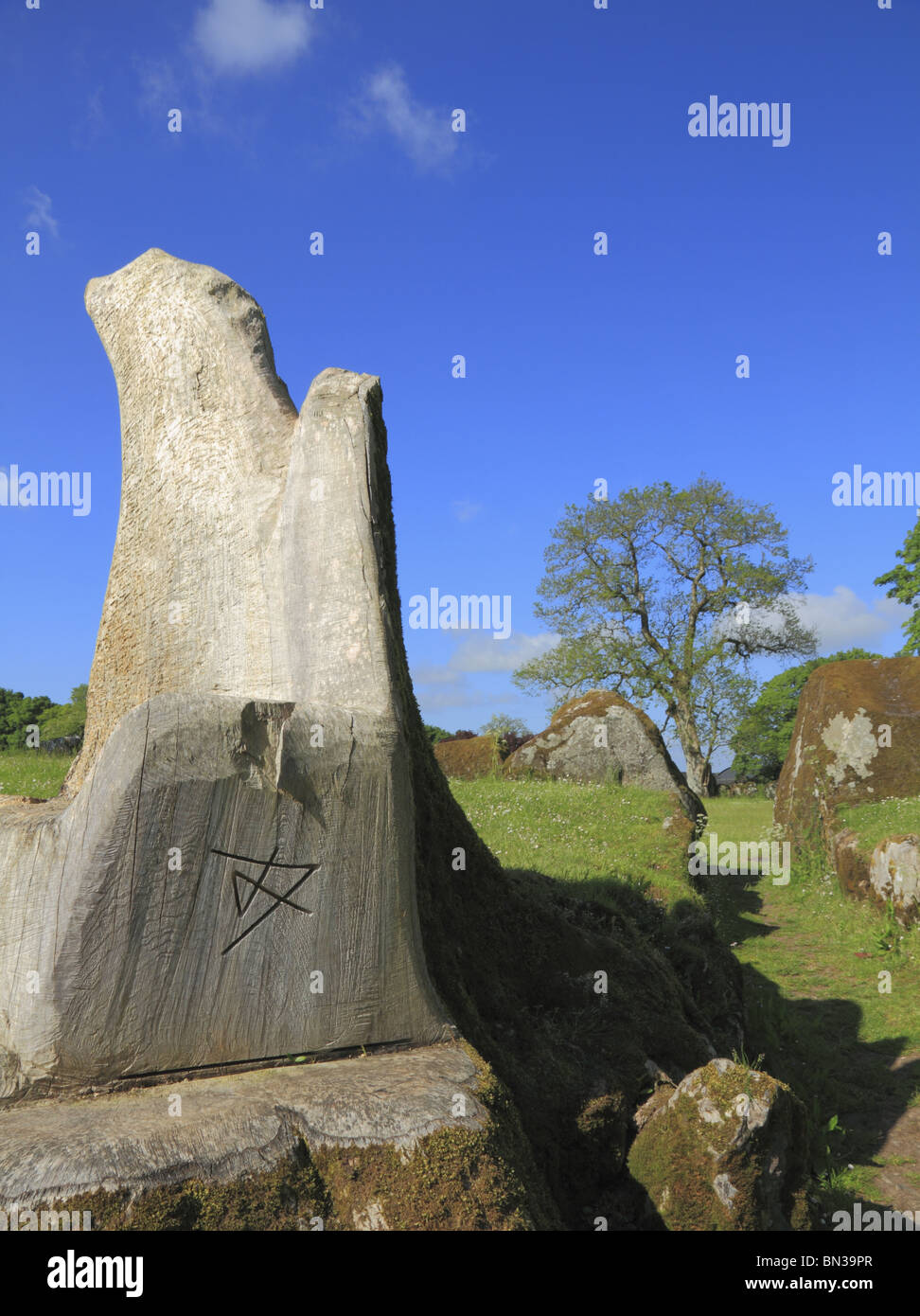 A piece of timber sculpture marks the entrance to Grange Stone Circle in County Limerick, Rep. of Ireland. Stock Photo