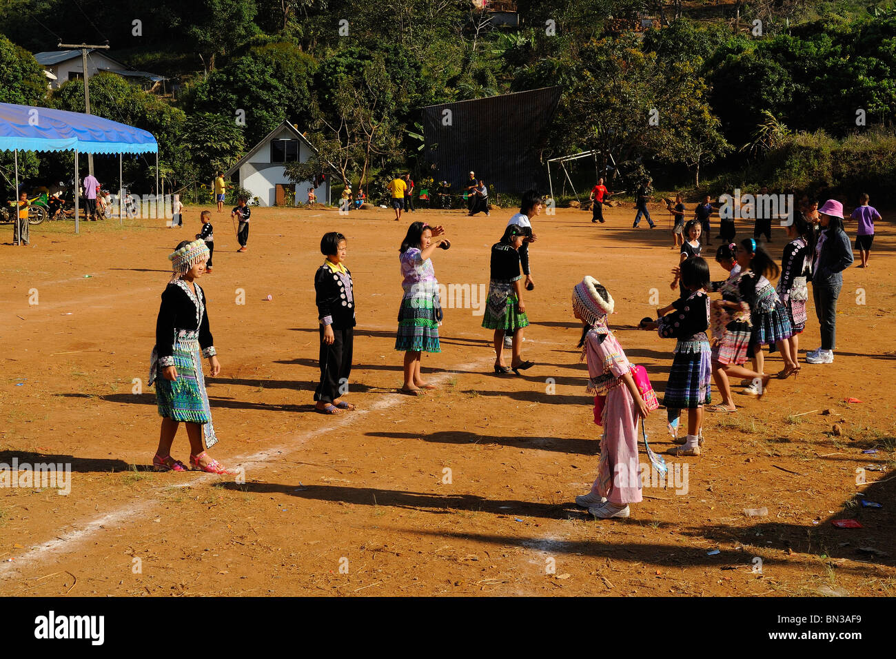 Hmong teenager playing the game of love in Ban Pha-nok-kok village, near Chiang Mai, Thailand, Asia Stock Photo