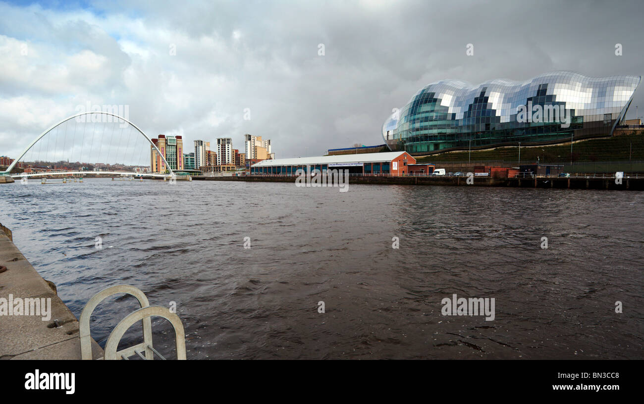 Gateshead Millennium Bridge, Baltic Centre for Contemporary Art and the Sage Centre Gateshead Newcastle upon Tyne England UK Stock Photo