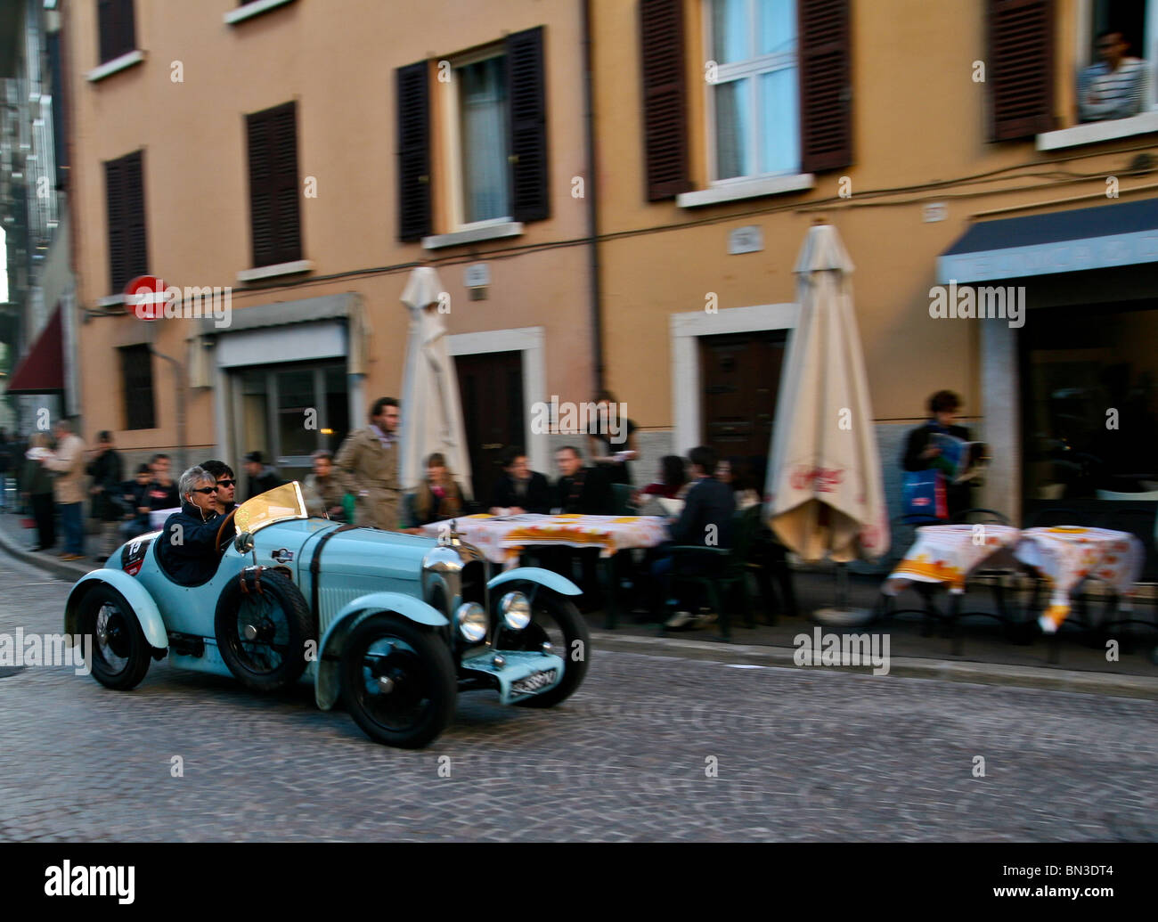 1927 Amilcar racing through the streets of Brescia at the start of the 2010 Mille Miglia Stock Photo