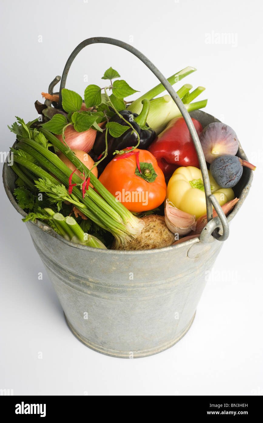 Bucket filled with assorted fresh vegetables Stock Photo