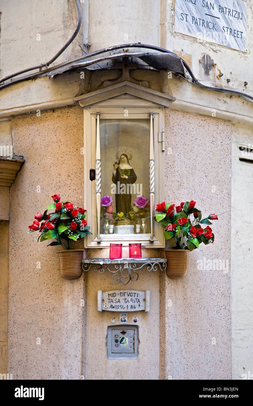 Sculpture on a house facade, Valletta, Malta, low angle view Stock Photo