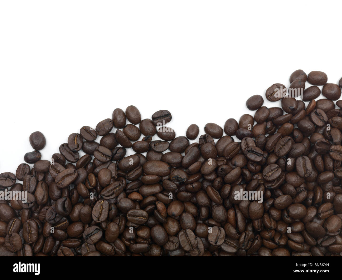 Coffee beans isolated against a white background Stock Photo - Alamy