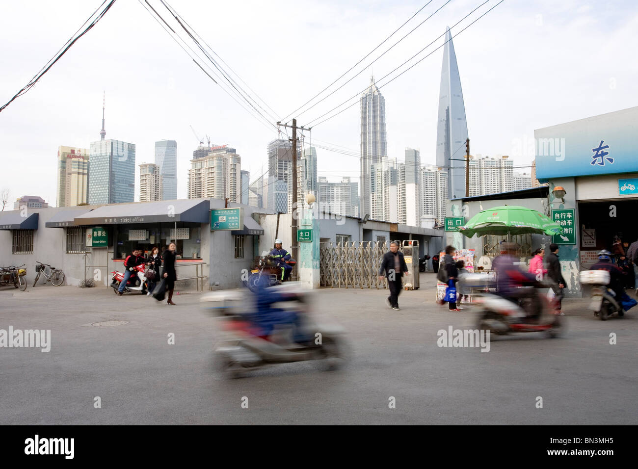 Street in Shanghai, skyline in the background, China Stock Photo