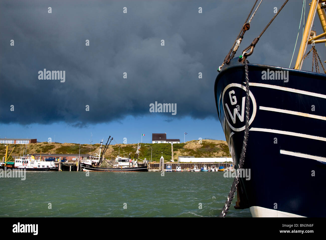 Thunderclouds above the harbour of Hoernum, Sylt, Germany Stock Photo
