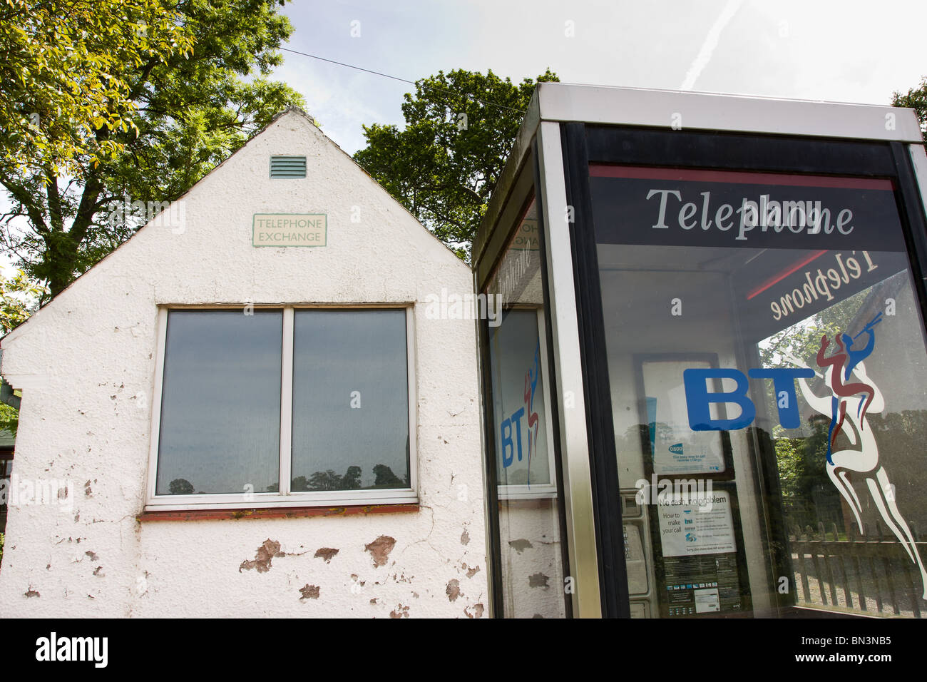 Rural old telephone exchange with modern phone box, Camptown, Scottish Borders. Stock Photo