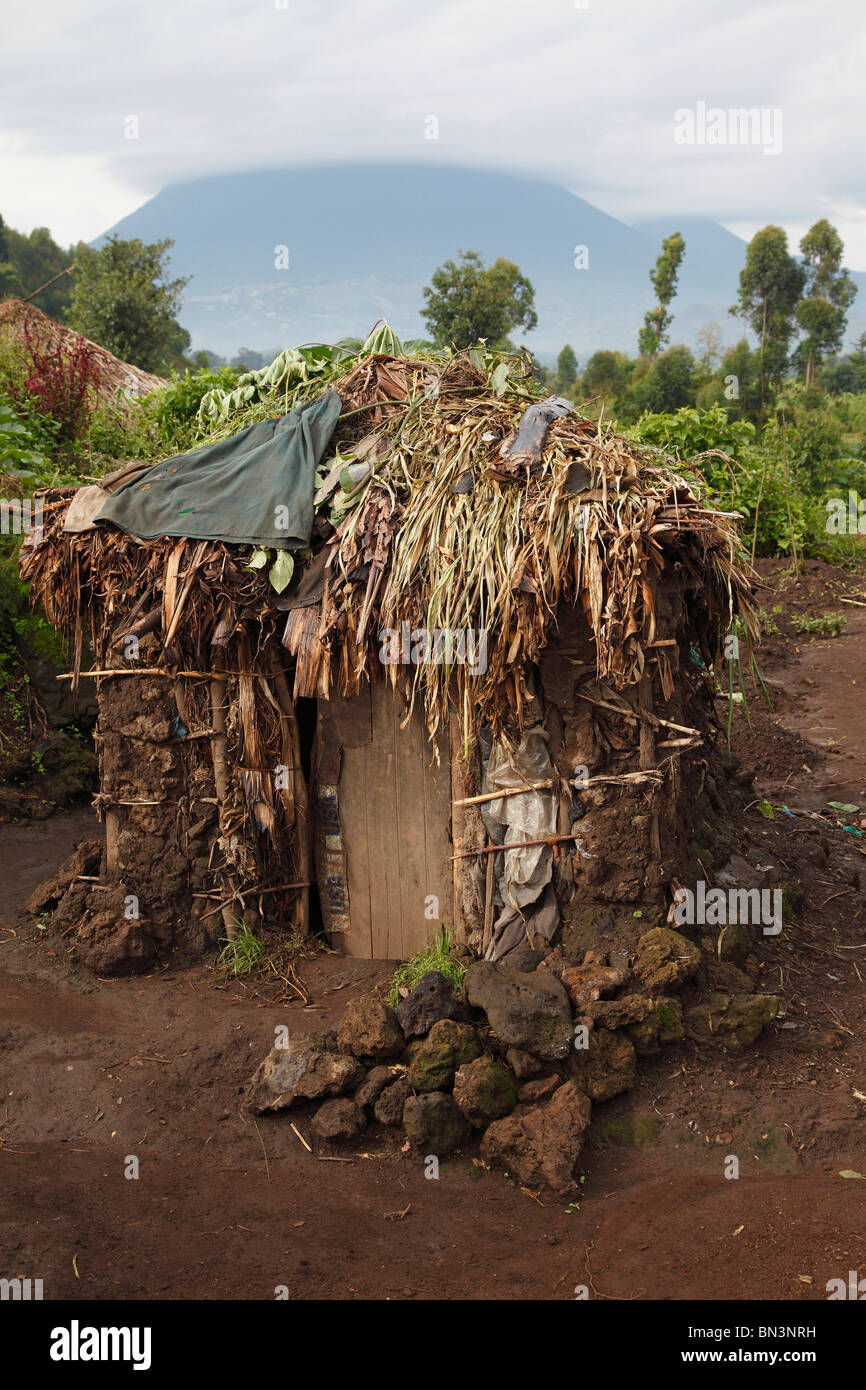 Mud hut in pygmy village, Uganda, East Africa, Africa Stock Photo