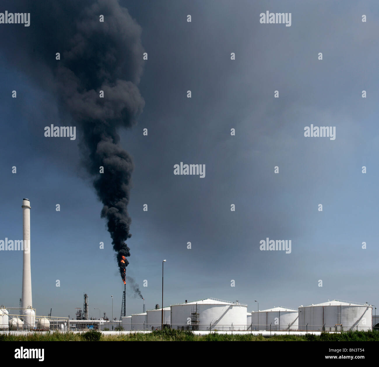 Smoke emitting from chimney Stock Photo - Alamy