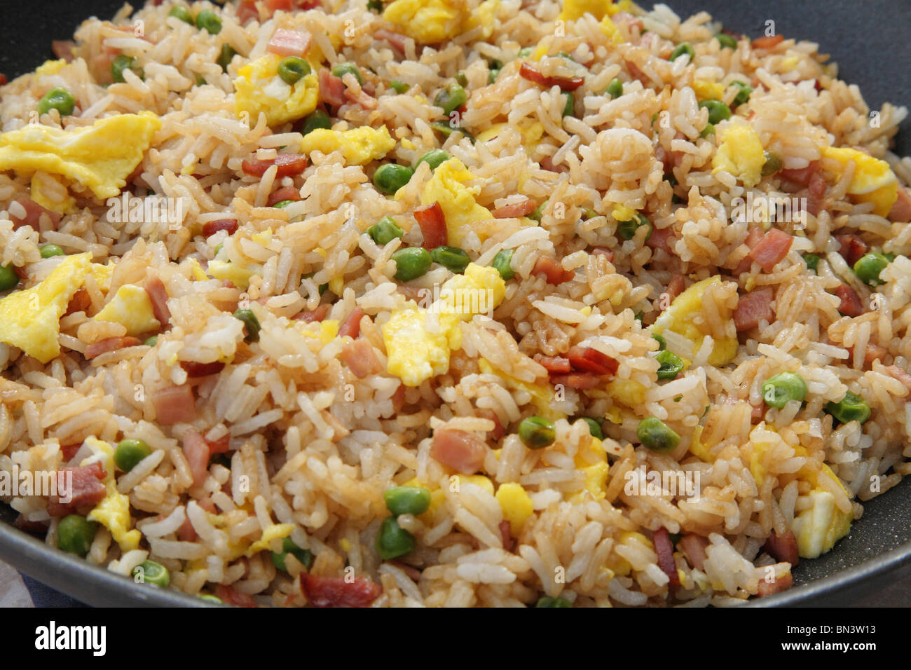 pan full of ham fried rice close up Stock Photo